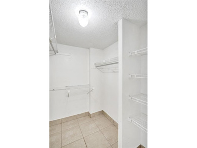 Spacious 2-Bedroom, 2-Bath Condo with Lake Views in Pine Island on Pine Island Ridge Country Club in Florida - for sale on GolfHomes.com, golf home, golf lot