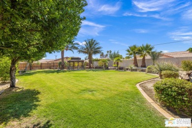 Introducing a custom-built (2002) desert retreat set on a on Bermuda Dunes Country Club in California - for sale on GolfHomes.com, golf home, golf lot