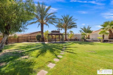 Introducing a custom-built (2002) desert retreat set on a on Bermuda Dunes Country Club in California - for sale on GolfHomes.com, golf home, golf lot