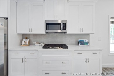 Immaculate, Light-Filled Home with First-Floor Primary & on Olde Liberty Golf and Country Club in North Carolina - for sale on GolfHomes.com, golf home, golf lot