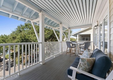 The Cape Fear Suite offers front-row views of the Bald Head on Bald Head Island Golf Club in North Carolina - for sale on GolfHomes.com, golf home, golf lot