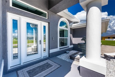 TURN-KEY, FULLY FURNISHED. REMODELED. X FLOOD ZONE. SITUATED ON on Rotonda Golf and Country Club The Palms Course in Florida - for sale on GolfHomes.com, golf home, golf lot