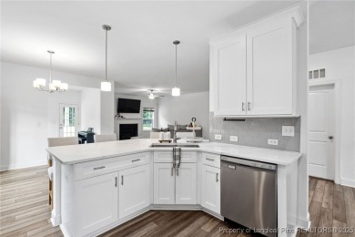 Immaculate, Light-Filled Home with First-Floor Primary & on Olde Liberty Golf and Country Club in North Carolina - for sale on GolfHomes.com, golf home, golf lot