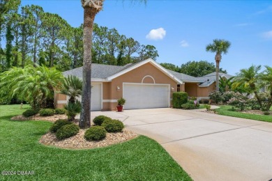 Nestled in the prestigious gated community of Plantation Bay in on Plantation Bay Golf and Country Club in Florida - for sale on GolfHomes.com, golf home, golf lot