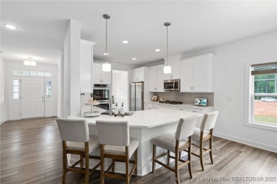 Immaculate, Light-Filled Home with First-Floor Primary & on Olde Liberty Golf and Country Club in North Carolina - for sale on GolfHomes.com, golf home, golf lot