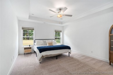 Immaculate, Light-Filled Home with First-Floor Primary & on Olde Liberty Golf and Country Club in North Carolina - for sale on GolfHomes.com, golf home, golf lot