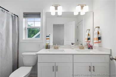 Immaculate, Light-Filled Home with First-Floor Primary & on Olde Liberty Golf and Country Club in North Carolina - for sale on GolfHomes.com, golf home, golf lot
