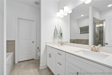 Immaculate, Light-Filled Home with First-Floor Primary & on Olde Liberty Golf and Country Club in North Carolina - for sale on GolfHomes.com, golf home, golf lot