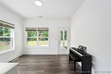 Immaculate, Light-Filled Home with First-Floor Primary & on Olde Liberty Golf and Country Club in North Carolina - for sale on GolfHomes.com, golf home, golf lot