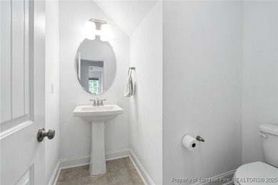 Immaculate, Light-Filled Home with First-Floor Primary & on Olde Liberty Golf and Country Club in North Carolina - for sale on GolfHomes.com, golf home, golf lot
