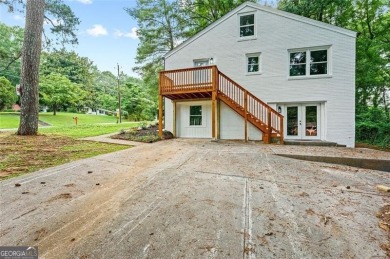 It's hard to miss this fully renovated, 4 side brick beauty on Alfred Tup Holmes Golf Course in Georgia - for sale on GolfHomes.com, golf home, golf lot