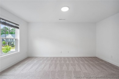 Immaculate, Light-Filled Home with First-Floor Primary & on Olde Liberty Golf and Country Club in North Carolina - for sale on GolfHomes.com, golf home, golf lot