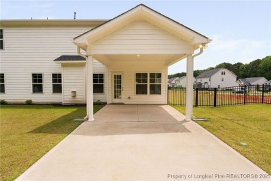 Immaculate, Light-Filled Home with First-Floor Primary & on Olde Liberty Golf and Country Club in North Carolina - for sale on GolfHomes.com, golf home, golf lot