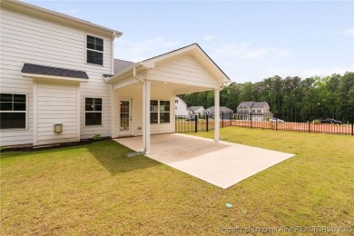 Immaculate, Light-Filled Home with First-Floor Primary & on Olde Liberty Golf and Country Club in North Carolina - for sale on GolfHomes.com, golf home, golf lot