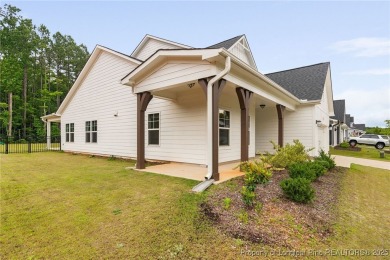 Immaculate, Light-Filled Home with First-Floor Primary & on Olde Liberty Golf and Country Club in North Carolina - for sale on GolfHomes.com, golf home, golf lot