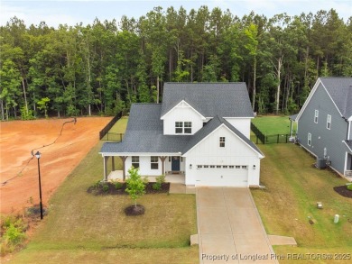 Immaculate, Light-Filled Home with First-Floor Primary & on Olde Liberty Golf and Country Club in North Carolina - for sale on GolfHomes.com, golf home, golf lot