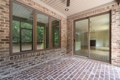 Stunning new lock and leave, low maintenance construction by on Pinewild Country Club of Pinehurst in North Carolina - for sale on GolfHomes.com, golf home, golf lot