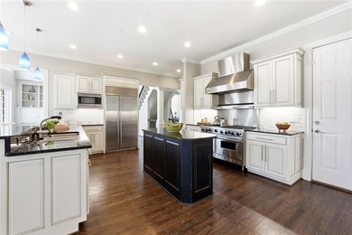 This stunning brick estate in prestigious, gated Laurel Springs on Laurel Springs Golf Club in Georgia - for sale on GolfHomes.com, golf home, golf lot