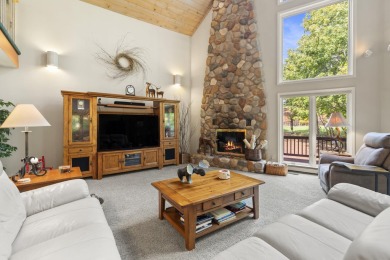 Experience year-round comfort and elegance in this meticulously on Crystal Mountain Golf Course in Michigan - for sale on GolfHomes.com, golf home, golf lot