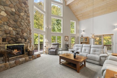 Experience year-round comfort and elegance in this meticulously on Crystal Mountain Golf Course in Michigan - for sale on GolfHomes.com, golf home, golf lot