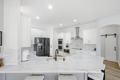 Discover the Sanctuary at Hammock Creek Golf Club in Palm City on Hammock Creek Golf Club in Florida - for sale on GolfHomes.com, golf home, golf lot