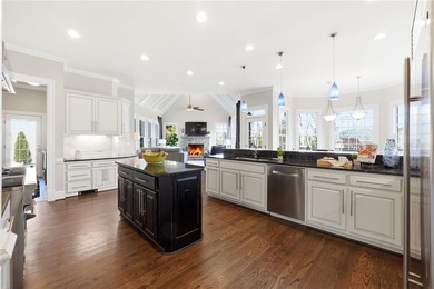 This stunning brick estate in prestigious, gated Laurel Springs on Laurel Springs Golf Club in Georgia - for sale on GolfHomes.com, golf home, golf lot