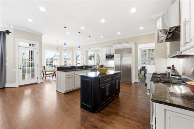 This stunning brick estate in prestigious, gated Laurel Springs on Laurel Springs Golf Club in Georgia - for sale on GolfHomes.com, golf home, golf lot