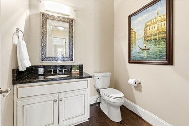 This stunning brick estate in prestigious, gated Laurel Springs on Laurel Springs Golf Club in Georgia - for sale on GolfHomes.com, golf home, golf lot