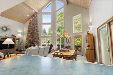 Experience year-round comfort and elegance in this meticulously on Crystal Mountain Golf Course in Michigan - for sale on GolfHomes.com, golf home, golf lot