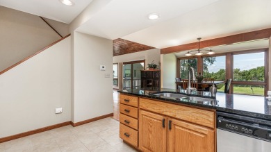 Perched above the fairways with commanding golf and wooded ridge on Eagle Ridge Inn and Resort in Illinois - for sale on GolfHomes.com, golf home, golf lot