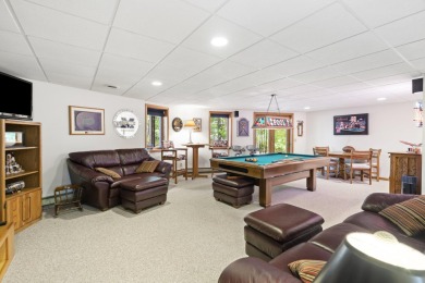 Experience year-round comfort and elegance in this meticulously on Crystal Mountain Golf Course in Michigan - for sale on GolfHomes.com, golf home, golf lot