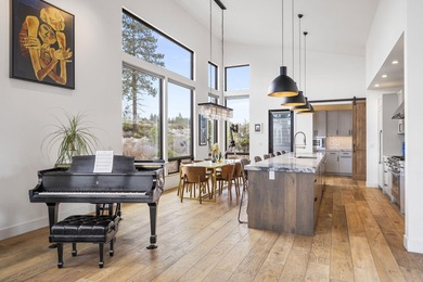 Commanding a private position on Tetherow's 18th tee, this on Tetherow Golf Club in Oregon - for sale on GolfHomes.com, golf home, golf lot