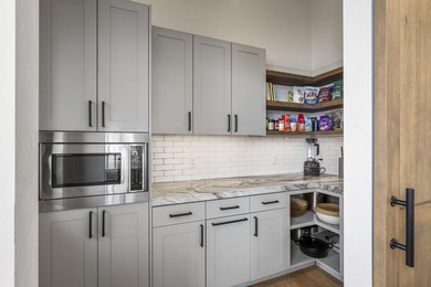 Commanding a private position on Tetherow's 18th tee, this on Tetherow Golf Club in Oregon - for sale on GolfHomes.com, golf home, golf lot