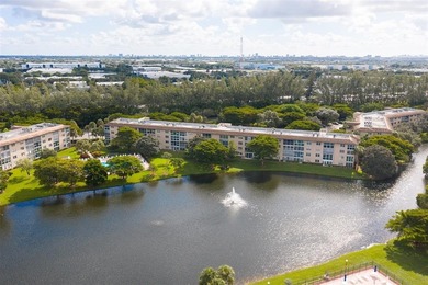 Updated 2-bedroom, 2-bath condo in the beautiful gated community on Wynmoor Golf Course in Florida - for sale on GolfHomes.com, golf home, golf lot