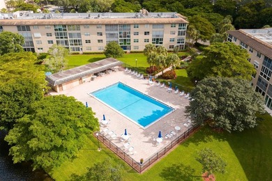 Updated 2-bedroom, 2-bath condo in the beautiful gated community on Wynmoor Golf Course in Florida - for sale on GolfHomes.com, golf home, golf lot