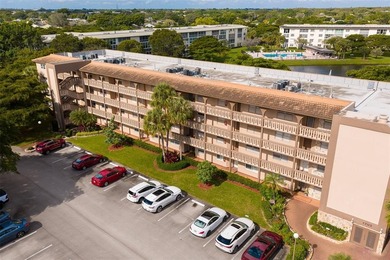 Updated 2-bedroom, 2-bath condo in the beautiful gated community on Wynmoor Golf Course in Florida - for sale on GolfHomes.com, golf home, golf lot