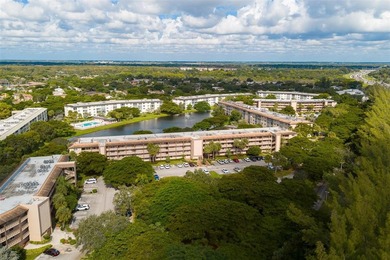Updated 2-bedroom, 2-bath condo in the beautiful gated community on Wynmoor Golf Course in Florida - for sale on GolfHomes.com, golf home, golf lot