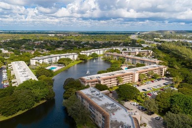 Updated 2-bedroom, 2-bath condo in the beautiful gated community on Wynmoor Golf Course in Florida - for sale on GolfHomes.com, golf home, golf lot
