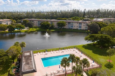 Updated 2-bedroom, 2-bath condo in the beautiful gated community on Wynmoor Golf Course in Florida - for sale on GolfHomes.com, golf home, golf lot