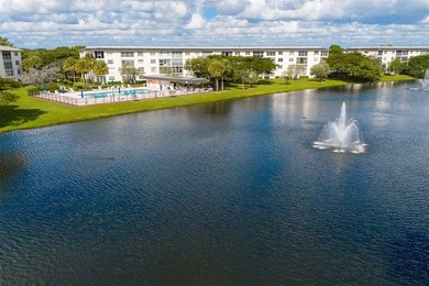 Updated 2-bedroom, 2-bath condo in the beautiful gated community on Wynmoor Golf Course in Florida - for sale on GolfHomes.com, golf home, golf lot