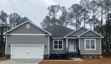 THIS HOME CAN CLOSE IN JANUARY! Home is almost  complete and on Harbour Point Golf Club in North Carolina - for sale on GolfHomes.com, golf home, golf lot