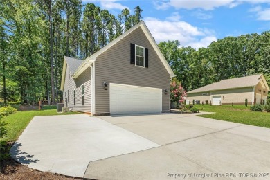 Fabulous home located in the gated and golf community of on Carolina Trace Country Club in North Carolina - for sale on GolfHomes.com, golf home, golf lot