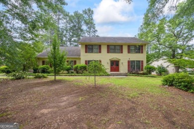 Nestled on hole one of the Honey Creek golf course, 705 on Honey Creek Country Club in Georgia - for sale on GolfHomes.com, golf home, golf lot
