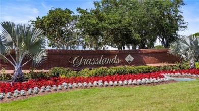 Under contract-accepting backup offers. Live the Country Club on Grasslands Golf and Country Club in Florida - for sale on GolfHomes.com, golf home, golf lot