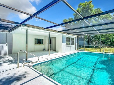 Under contract-accepting backup offers. Wow! Wow! Wow!!! A pool on Beacon Woods Golf Club in Florida - for sale on GolfHomes.com, golf home, golf lot