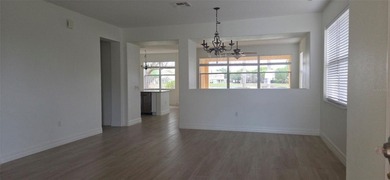 Exceptional residence in the prestigious gated community of on Eagle Creek Golf Club in Florida - for sale on GolfHomes.com, golf home, golf lot