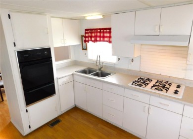 Although this is a charming 2-Bedroom, 1.5-Bath Single Wide in on Betmar Acres Golf Club in Florida - for sale on GolfHomes.com, golf home, golf lot