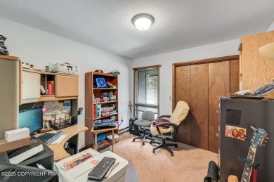 Welcome to 299 Echo Lake Rd, a striking mid-century modern-style on Pocono Farms Country Club in Pennsylvania - for sale on GolfHomes.com, golf home, golf lot