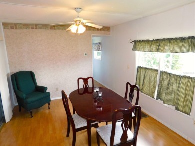Although this is a charming 2-Bedroom, 1.5-Bath Single Wide in on Betmar Acres Golf Club in Florida - for sale on GolfHomes.com, golf home, golf lot
