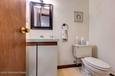 Welcome to 299 Echo Lake Rd, a striking mid-century modern-style on Pocono Farms Country Club in Pennsylvania - for sale on GolfHomes.com, golf home, golf lot